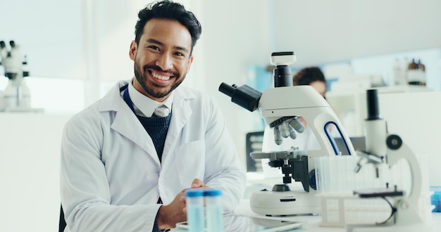 man-scientist-happy-with-study-portrait-pride-career-with-medical-research-project-person-smile-tech-with-pharmaceutical-review-vaccine-development-with-app-laboratory_590464-535386